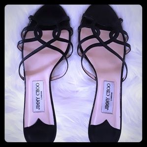 Jimmy Choo low heeled dress shoes.
